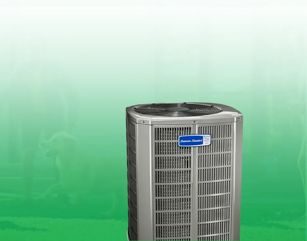 Air conditioning unit on a lawn with a muted background of a sports event.